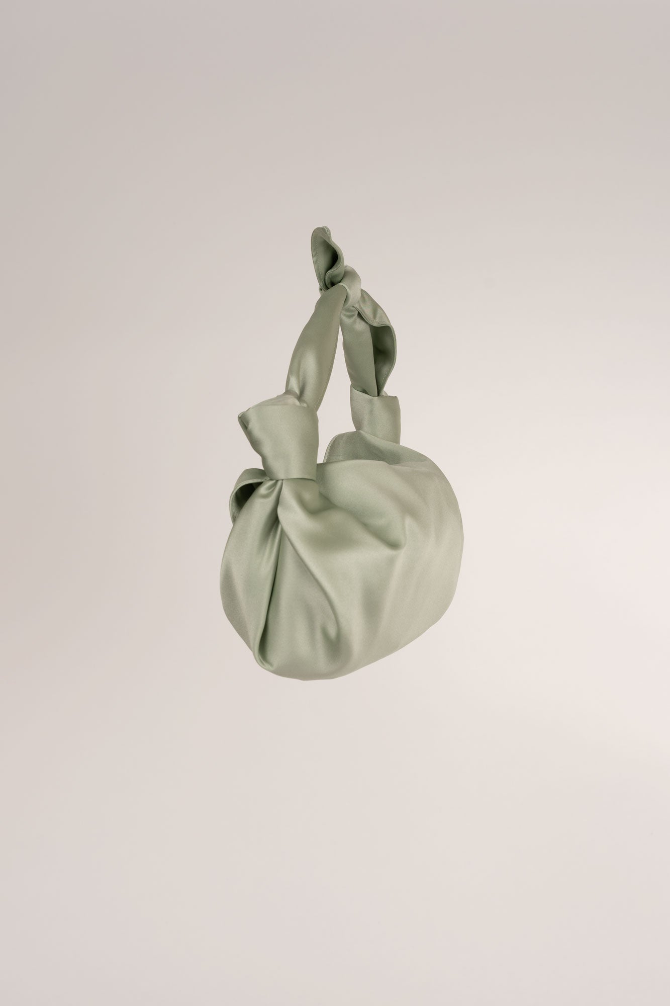 MLE Nodo Mini Clutch Satin Handbag in Celadon