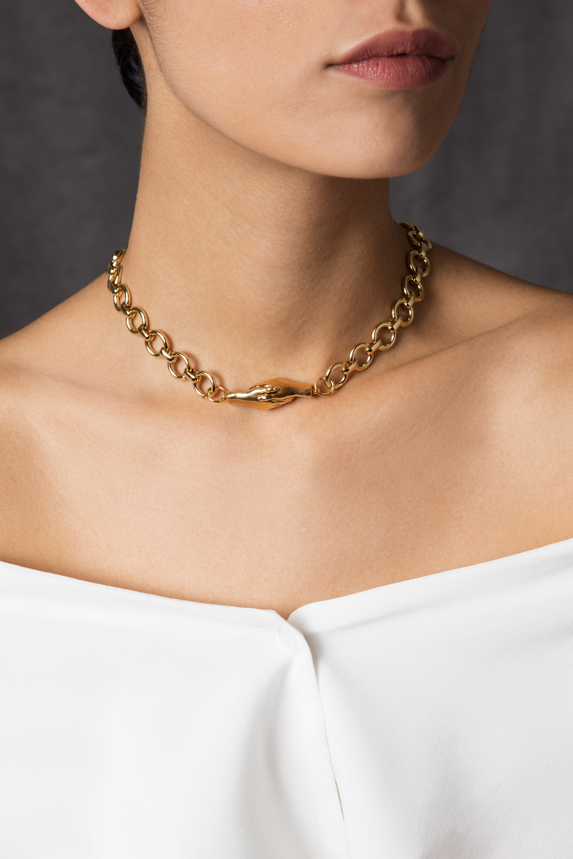 Woman wearing the Gold-plated Gentlewoman's Agreement Necklace